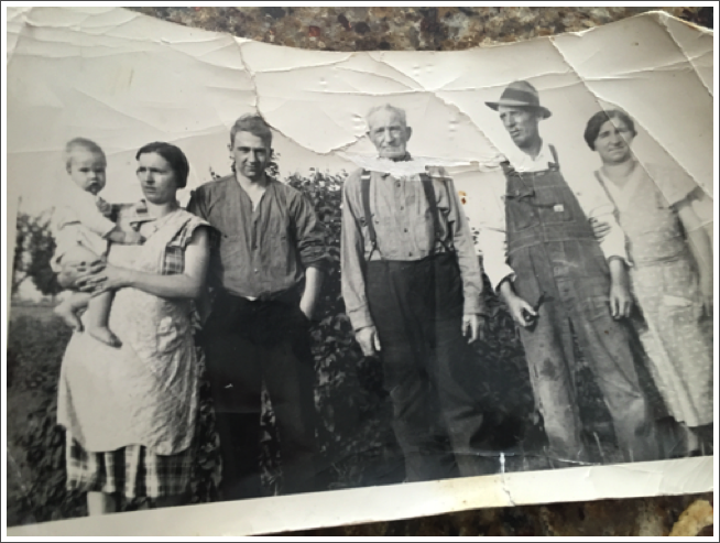 Wellington Udell in middle, son of John Udell and Margaret Westunberger, beside him to his left is John Wesley Udell and his wife Mildred (McKay) Udell